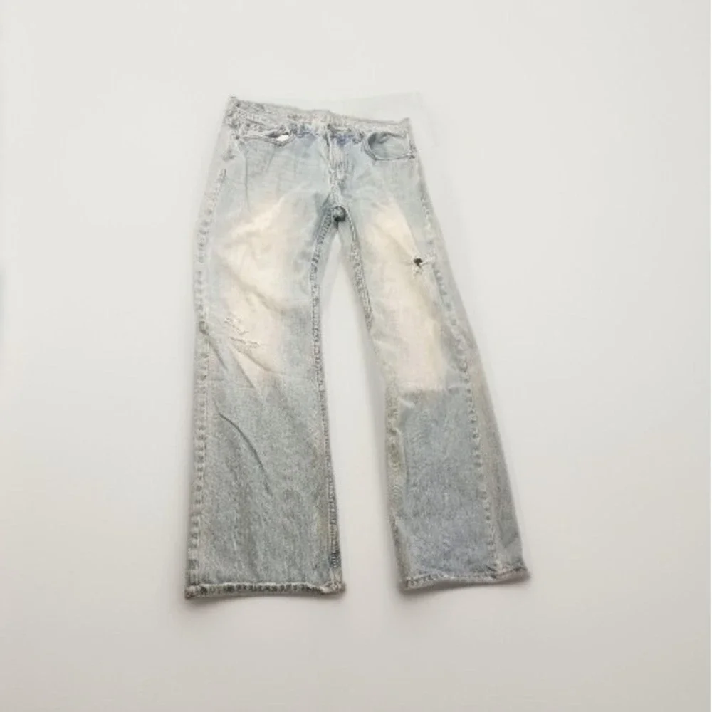 VTG American Eagle Low Rise Boot Jeans Mens Fit 32x30 Light Wash Blue Distressed